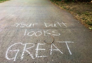 Slow runs give us a chance to appreciate the sights and sounds of the trail, like this message on the Boulder Creek Path. Photo by David Roche