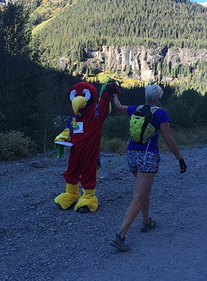 An aptly costumed volunteer at Camp Bird, on the climb to Imogene Pass.