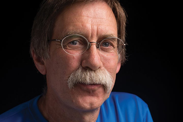 A portrait of runner Tom Green